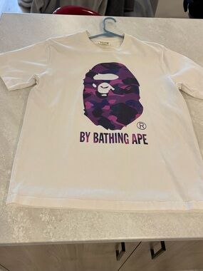 A Bathing Ape (BY BATHING APE) White T-Shirt with Purple Camo Ape Logo